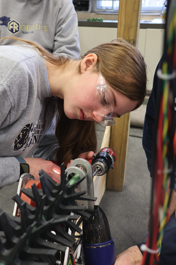 Evelyn working on the robot